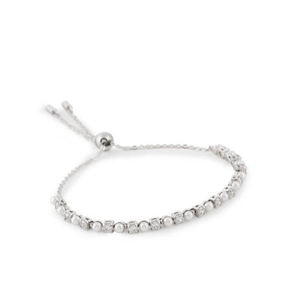 SWAROVSKI Mod. 5689633 Matrix Tennis bracelet features alternating Swarovski Crystal Pearls and Swarovski Zirconia.