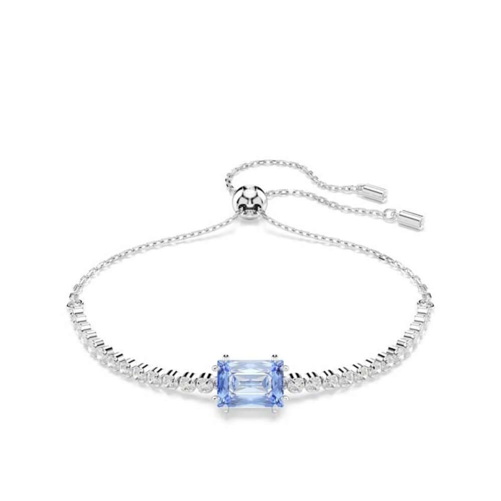 Elegant Swarovski bracelet with blue gemstone, delicate silver chain, adjustable clasp, perfect for stylish wear, gift option for women.