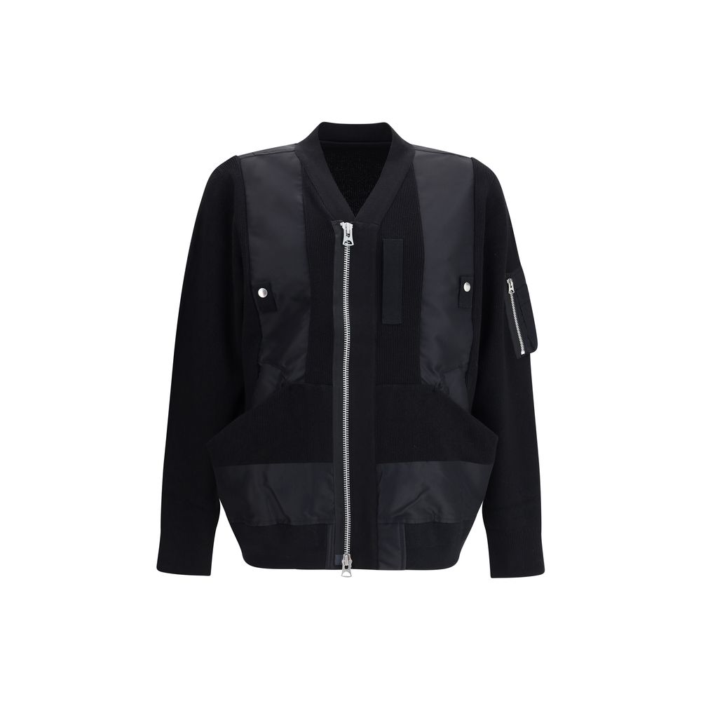 Sacai Black Cotton Bomber jacket with double-slider front zipper and ribbed trim, showcasing modern style and functionality.