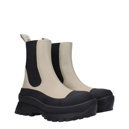 Stella McCartney Black Leather Ankle Boots with eco-friendly materials, mid heels, rubber sole, and back logo in casual style.