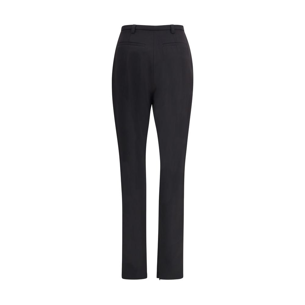The Latest Black Polyester Skinny Pants with high-waisted design, slit hem, and zippered closure. Ideal for day to evening wear.