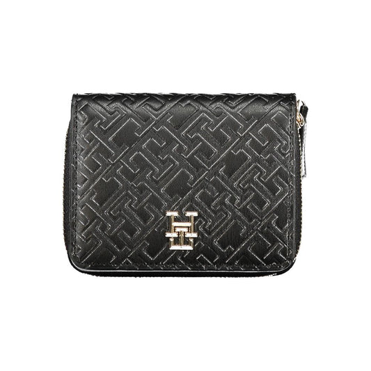 Tommy Hilfiger Black Polyethylene Wallet with logo, coin purse, card slots, contrasting details, and zip closure.