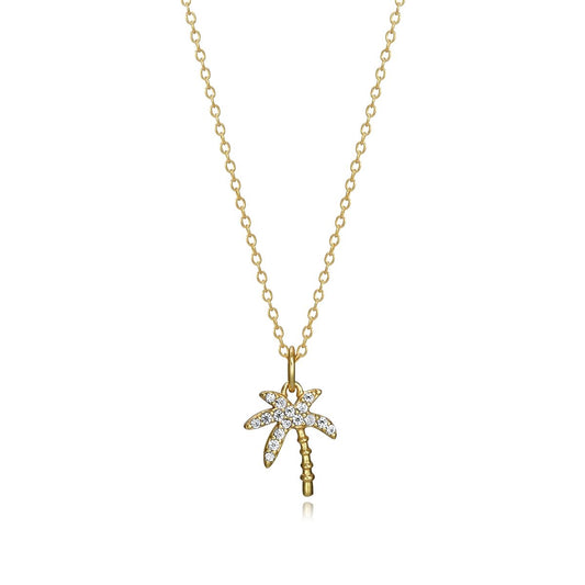 Gold necklace with a palm tree pendant adorned with crystals. Elegant and stylish jewelry piece for ladies. Perfect for chic occasions.