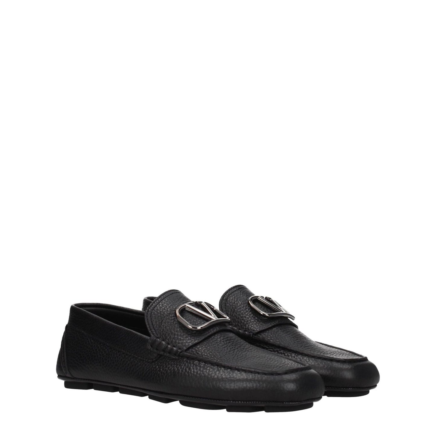 Valentino Garavani Black Leather Slip-On Loafers with round toe, rubber sole, and silver logo detail, low flat heel.