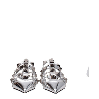 Valentino Garavani Gray Leather Flat Sandals with studs and silver patent leather, featuring a pointy toe and buckle closure.