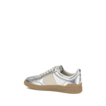 Valentino Garavani Laminated leather Upvillage Sneakers in gold with tassel detail and studded rubber sole, AW25 collection.