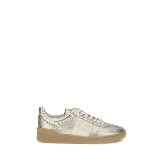 Valentino Garavani Laminated leather Upvillage Sneakers with tassel detailing and iconic studded rubber sole, AW25 collection.