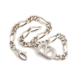 Valentino Garavani Ovalette Bracelet with silver-tone curb chain and VLogo Signature, featuring a lobster claw fastening.