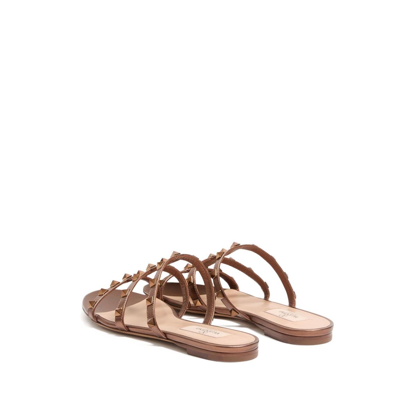 Valentino Garavani Rockstud Low Slide Sandal in Laminated Nappa Leather with brown slip-on style and signature Rockstud embellishment.