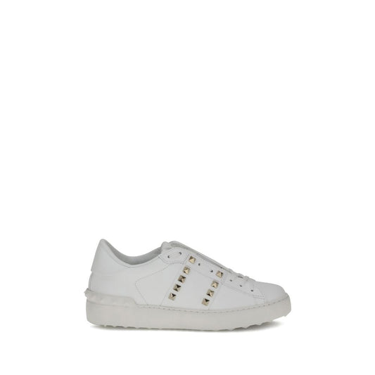 Valentino Garavani Rockstud Untitled SneakersValentino Garavani’s Rockstud Untitled Sneakers are a bold and refined interpretation of urban style. Made of calfskin, they feature a platinum-finish stud appliqué band that lends a touch of shine and grit to