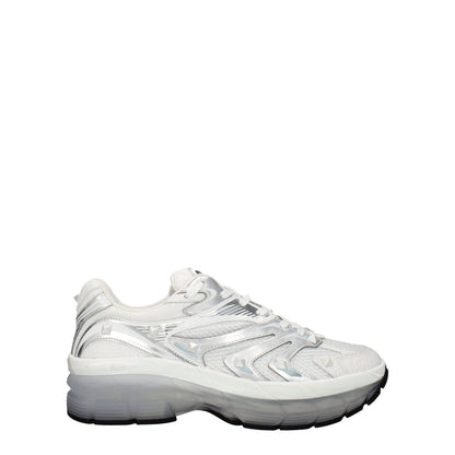 Valentino Garavani White Fabric Athletic Sneakers with silver accents and rubber sole, featuring studs and a round toe design.