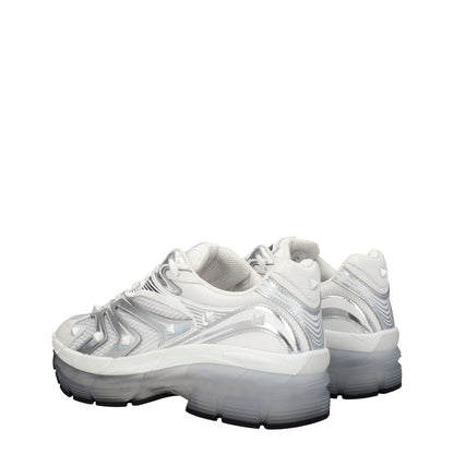 Valentino Garavani White Fabric Athletic Sneakers with studs, lace-up closure, and rubber sole, featuring a 5 cm mid heel and round toe.