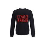 Valentino Le Chat De La Maison Sweater with red text on black fabric, showcasing casual elegance and style.