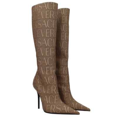 Versace Beige Fabric Boots with high heel, pointy toe, and logo design. Features zip closure, leather sole, 11 cm heel height. Casual style.