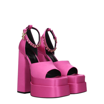 Versace Pink Satin Platform Sandals with open toe and high heel, featuring fuchsia satin, buckle closure, and rhinestone side detail.