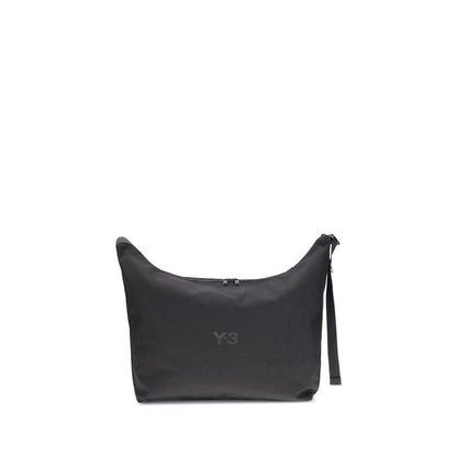 Y-3 Black Polyamide Shoulder Bag with large compartment and adjustable strap, minimal design, logo detail, perfect for everyday use.