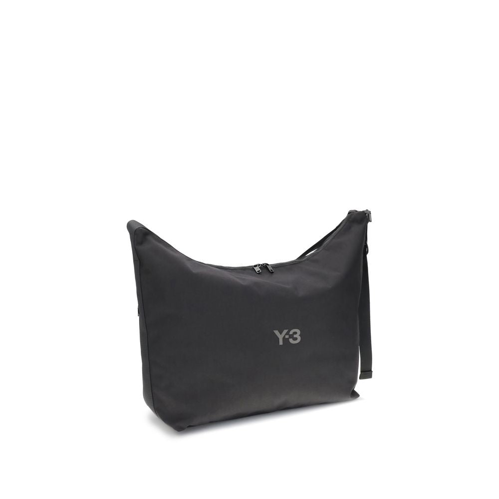 Y-3 Black Polyamide Shoulder Bag with logo detail, adjustable strap, and zippered closure, ideal for everyday use.