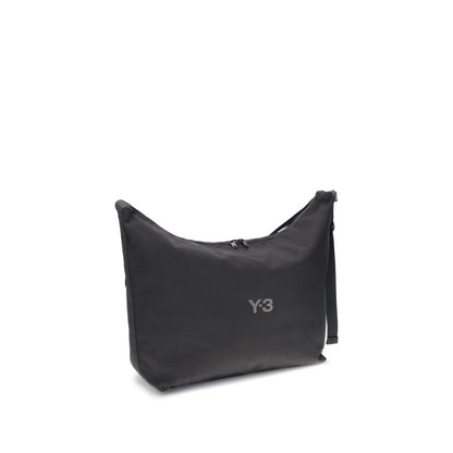 Y-3 Black Polyamide Shoulder Bag with logo detail, adjustable strap, and zippered closure, ideal for everyday use.