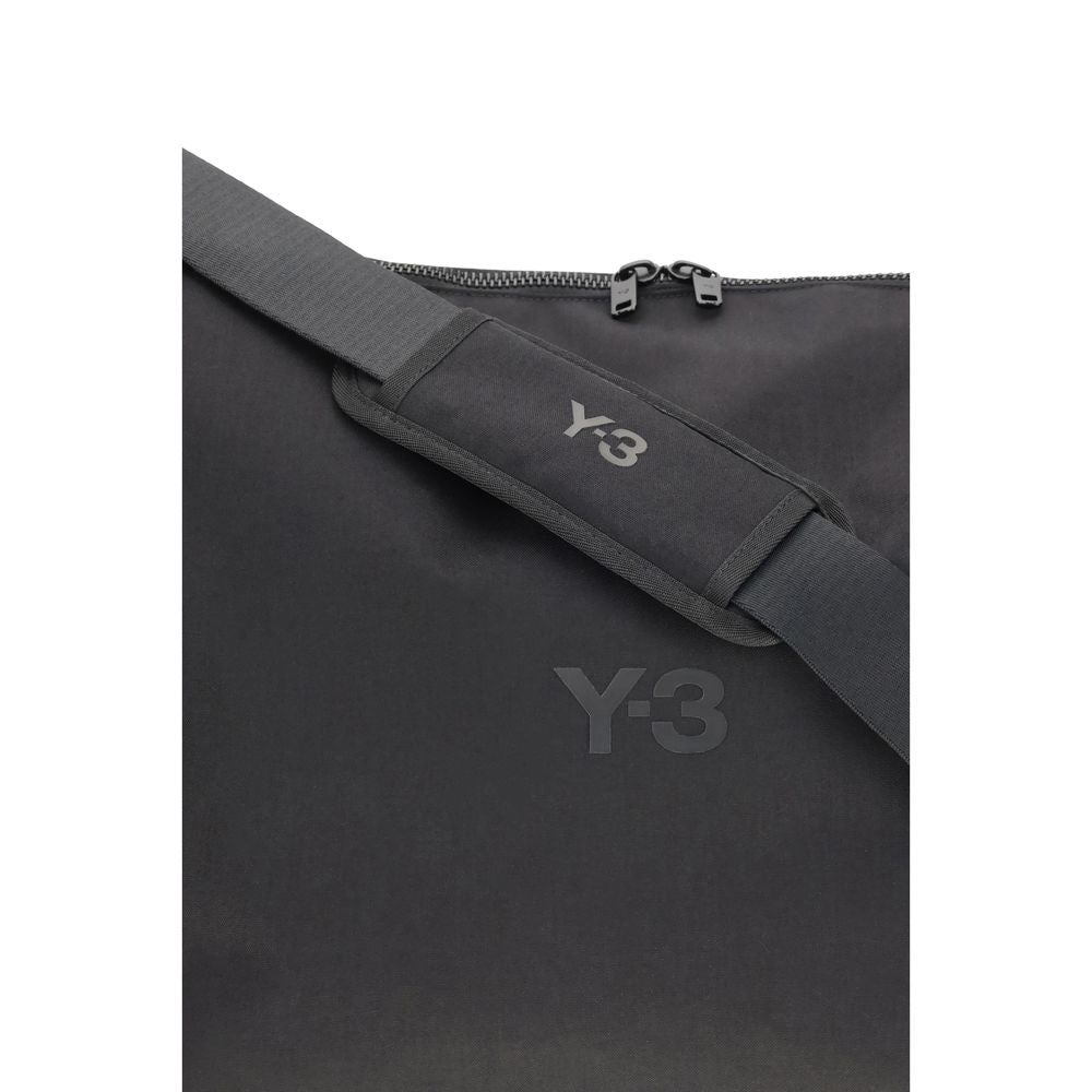 Y-3 Black Polyamide Shoulder Bag featuring adjustable strap and logo detail, perfect for everyday use with contemporary design.