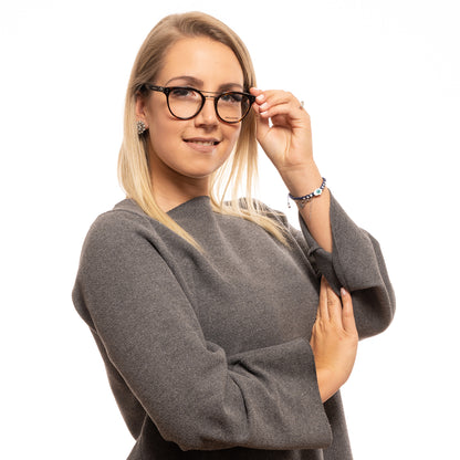 Woman wearing ZADIG & VOLTAIRE MOD. VZV217 490743 eyeglasses, styled for a sophisticated look.
